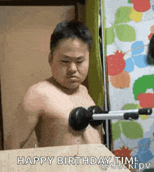 a shirtless man is lifting a dumbbell and says happy birthday tim .