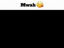 a close up of a person 's face with a smiley face and the words mwah above it