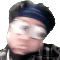 a blurry picture of a person wearing glasses and a blue headband made with unscreen