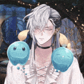 a man with long white hair and a choker has two blue balls on his shoulder