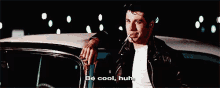 a man leaning on the back of a car with the words be cool huh