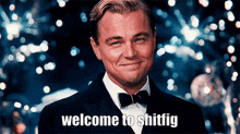 a man in a suit and bow tie is smiling with the words welcome to shitfig below him