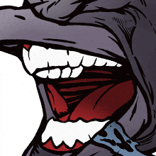 a close up of a person 's mouth with a red tongue
