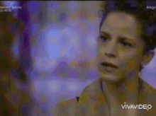 a woman 's face is shown on a screen with the words vivavideo on the bottom right