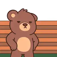 a brown teddy bear is standing with his hands on his hips in front of a wooden fence