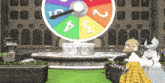 a rainbow colored wheel with the numbers 1 2 3 4 5 6 7 8 9 and 10 on it