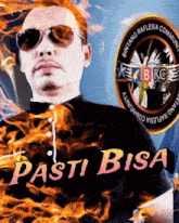 a man wearing sunglasses and a shirt that says pasti bisa on it