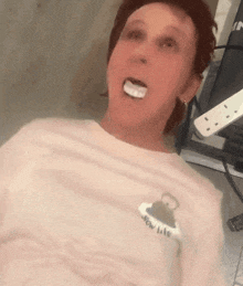 a woman is wearing a shirt that says slow life on it