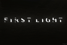 a black background with the first light 007 logo
