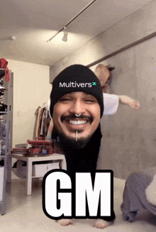 a man with a beard wearing a multivers hat
