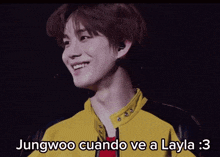 jungwoo cuando ve a layla : 3 is written below a picture of jungwoo