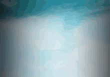 a blue and white background with a few clouds in it