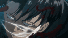 a close up of a person 's face with a knife in it