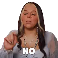 a woman wearing a necklace says no with her hand