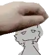 a hand is holding a cartoon character 's head and making a face .