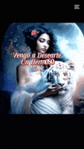 a painting of a woman holding a tiger with the words vengo a desearte un hermoso on the bottom