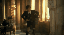 a man in a suit and tie is standing in a hallway