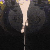 a person standing in front of a drum that says ec 26