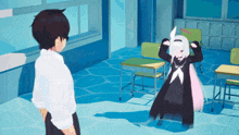 a man and a girl are standing in a room with desks