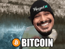a man wearing a hat that says blizzard on it is smiling with the word bitcoin in front of him