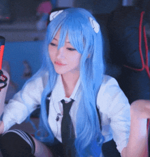 a girl with long blue hair and ears is wearing a tie