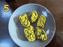 a plate of food with the number 5 on the bottom right