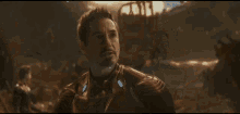 tony stark and spider-man are standing next to each other in a scene from the movie avengers infinity war