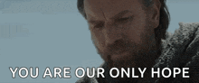 a man with a beard is saying `` you are our only hope '' in a movie .
