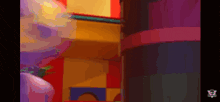 a cartoon character is standing in a room with a lot of colorful blocks on the wall .