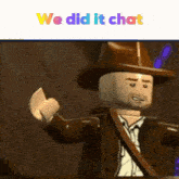 a lego man wearing a cowboy hat is giving a thumbs up