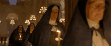 Nuns Candles GIF - Nuns Candles Run GIFs