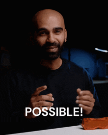 a bald man with a beard and a black shirt says " possible "