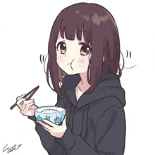 a girl in a black hoodie is holding a bowl of rice and chopsticks