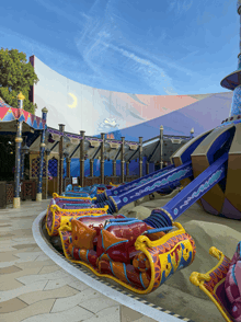 a roller coaster with a sign that says " no smoking "
