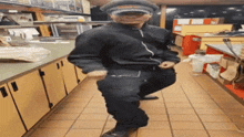 a man wearing a hat that says subway on it