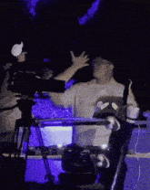 a man playing a keyboard with a sticker on it that says ' ssr ' on it