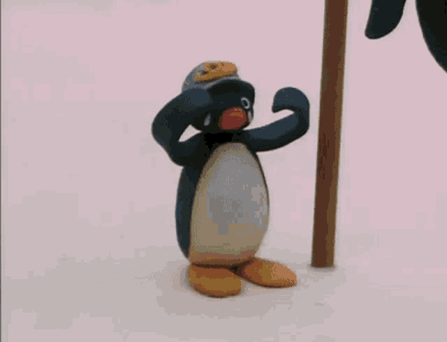 sad penguin gif