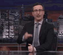 Cheers John Oliver GIF - Cheers John Oliver Drink GIFs