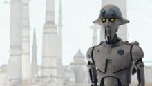 a robot with a helmet on stands in front of buildings