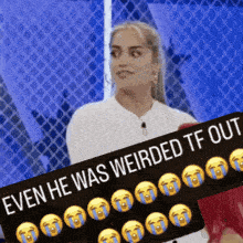 a woman is holding a sign that says even he was weirded tf out