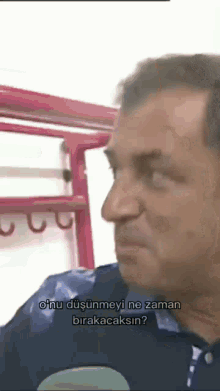 a man in a blue shirt says " onu düşünmeyi ne zaman birakacaksin ? "
