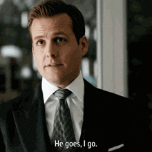 a man in a suit says he goes i go