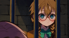 a girl with glasses is behind bars and looking out