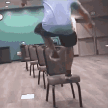 Jumping On The Chairs Daniel Gorham GIF