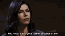 a man in a hat is talking to a woman and duke did n't know he had a son .