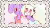 a picture of a purple and a white cat hugging each other .