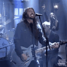 Playing Guitar Dave Grohl GIF - Playing Guitar Dave Grohl Foo Fighters GIFs