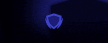 a blurry picture of three blue lights on a dark background
