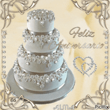 a picture of a wedding cake with the words feliz aniversario written on it