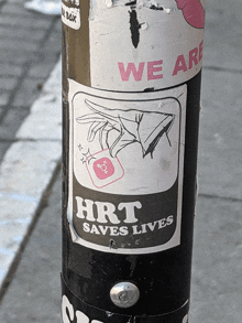 a sticker that says hrt saves lives on a pole